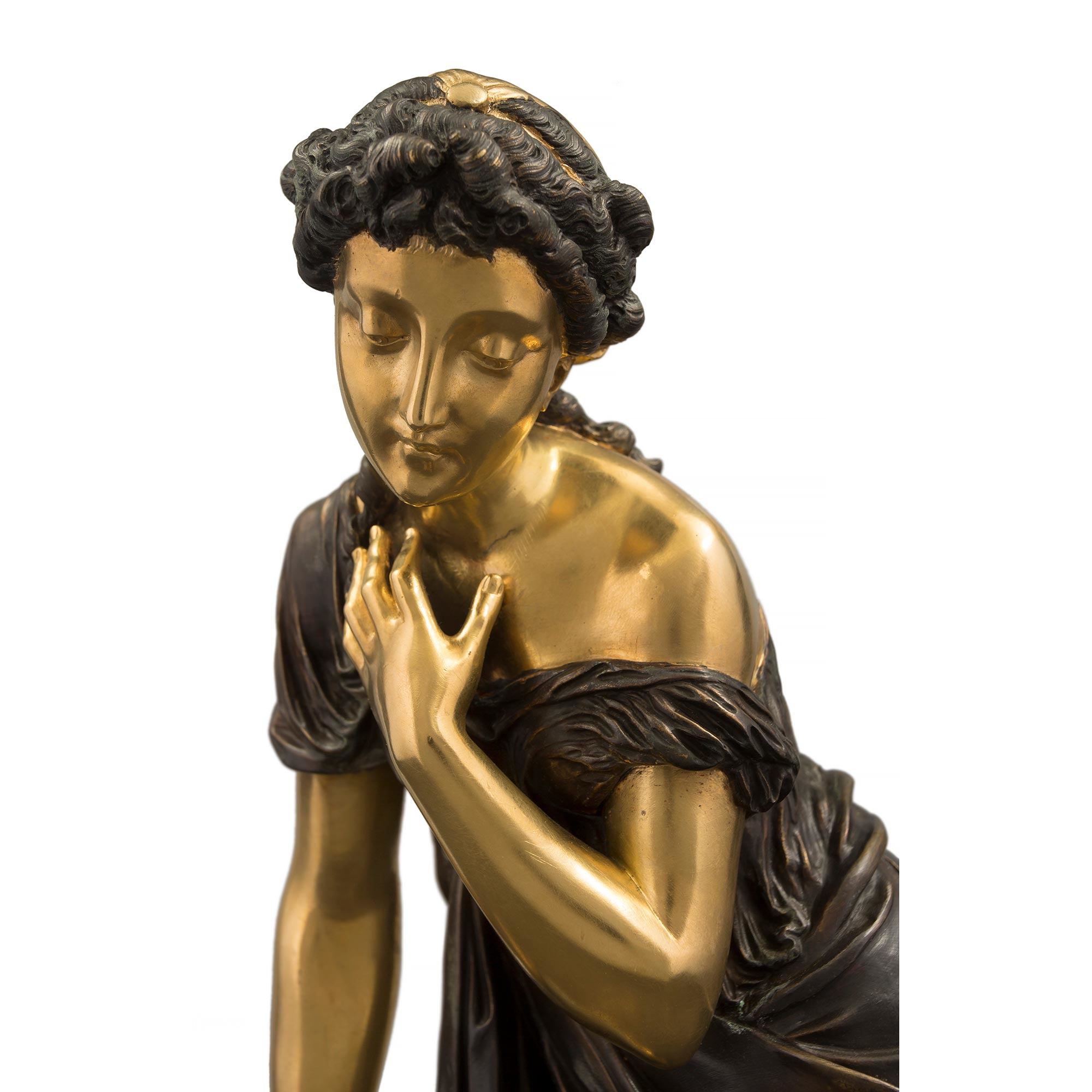 A French 19th century Louis XVI st. bronze and ormolu statue of a maiden, attributed to Pierre ...