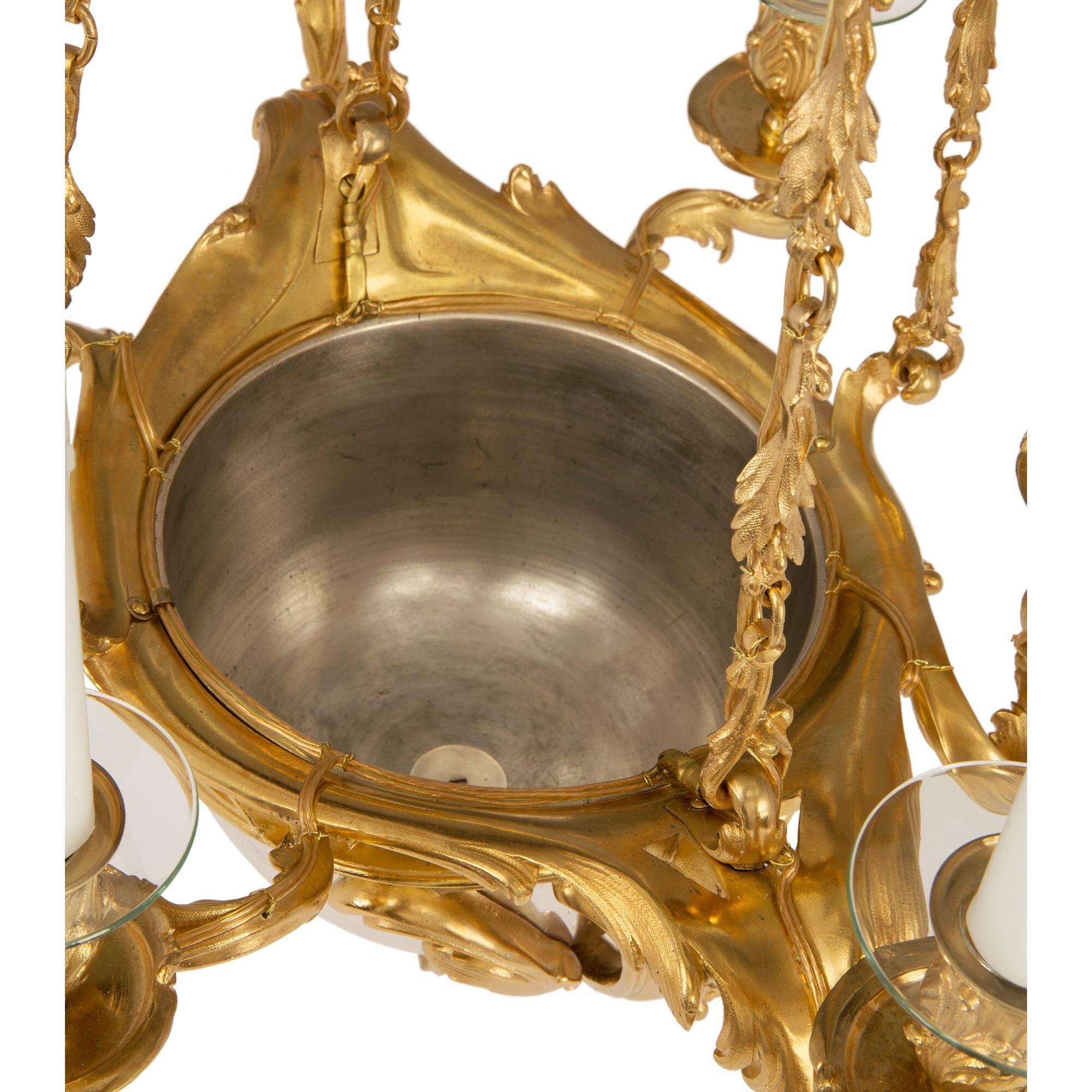 A French 19th century Louis XV st. silvered bronze and ormolu six light chandelier, attributed ...