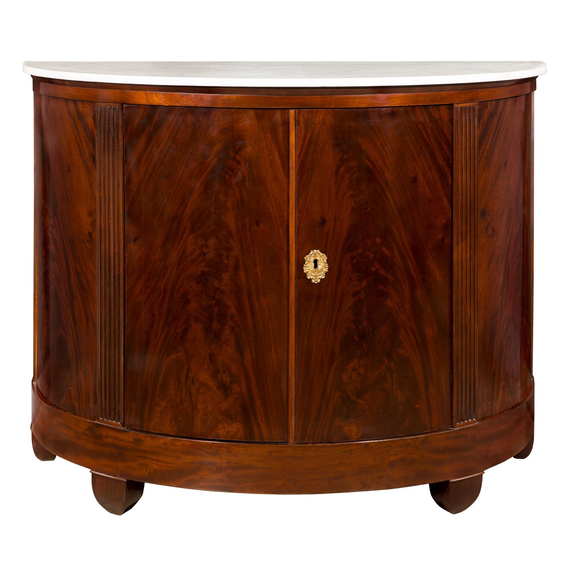 A French Early 19th Century Flamed Mahogany Demi Lune Console