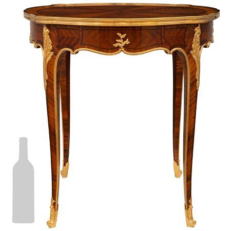 A French 19th century Louis XV st. Tulipwood,  Kingwood and Ormolu side table, signed Krieger, Paris