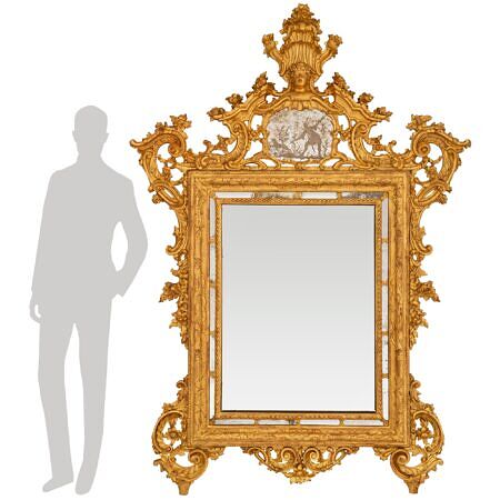 An Italian 18th century Baroque st. Giltwood mirror, from the collection of Hugh Hefner